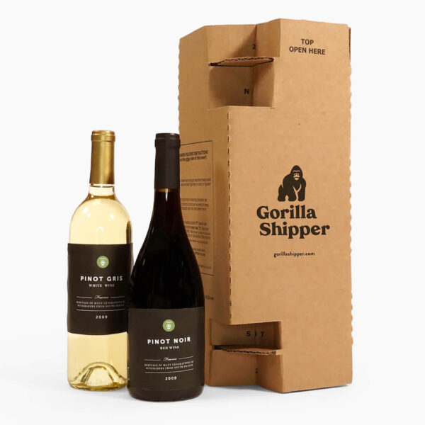 Two wine bottles next to a cardboard insert