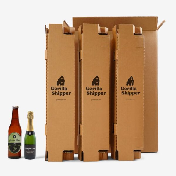 Bottles next to cardboard packaging File name: 12-pack-beer-shipper