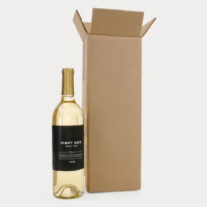 A liquor bottle next to a cardboard box