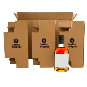 A spirit bottle in front of cardboard packaging