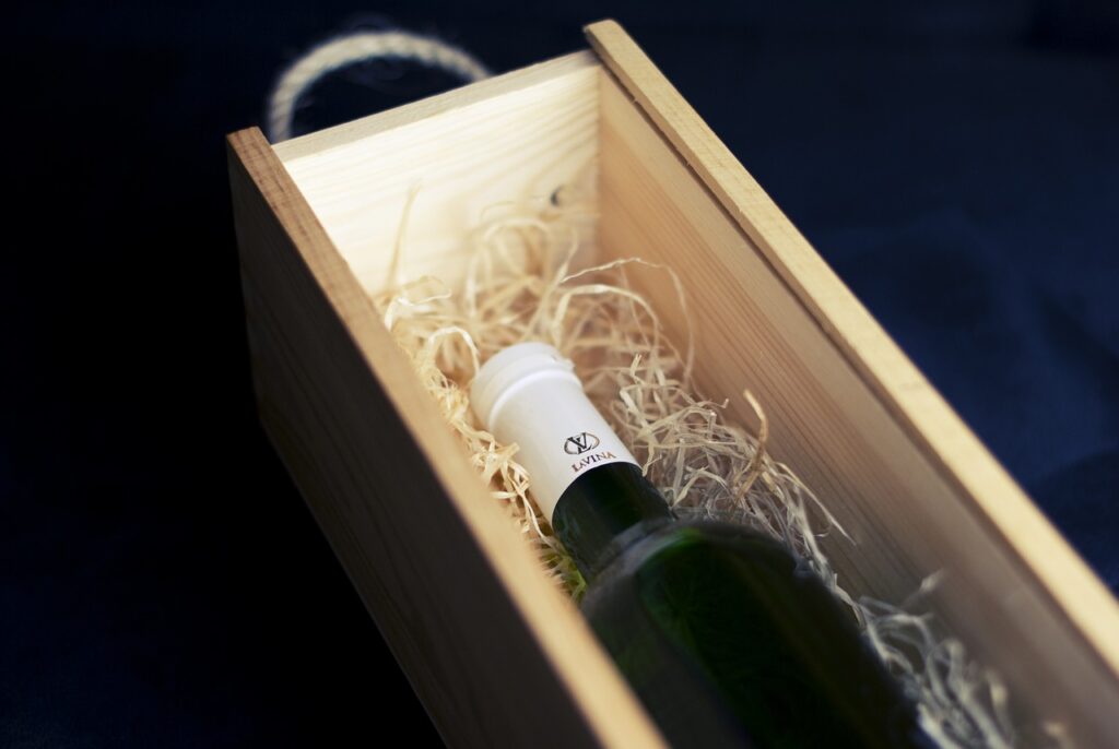 Wine bottle inside a wooden box