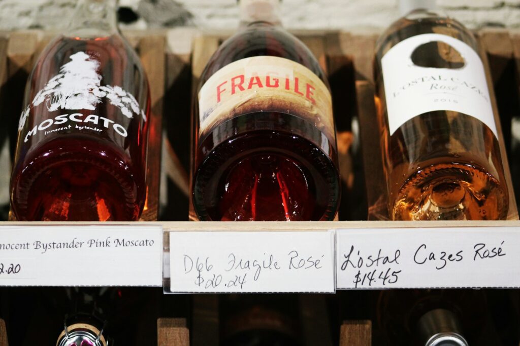 Three bottles of wine on display in a winery